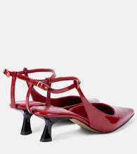 Souliers Martinez Camelia patent leather pumps