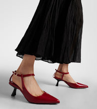 Souliers Martinez Camelia patent leather pumps