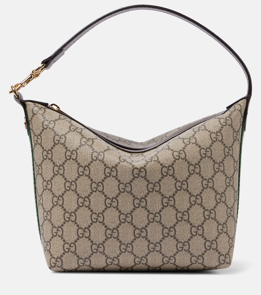 Gucci Ophidia GG Canvas Super Mini shoulder bag. Shop Gucci Top-Handle Bags for women now.