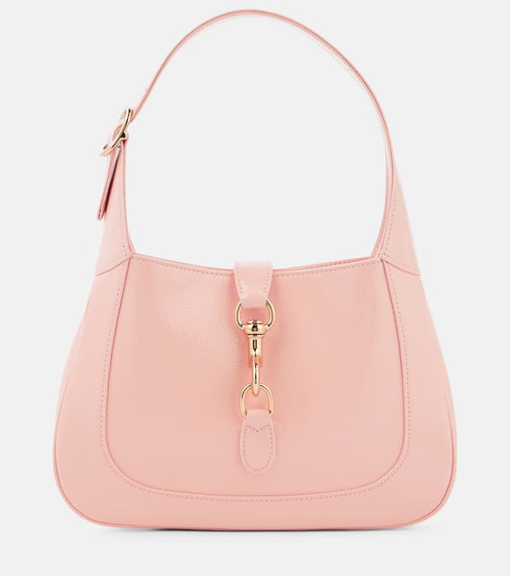 Gucci Gucci Jackie Small patent leather shoulder bag. Shop Gucci Shoulder Bags for women now.