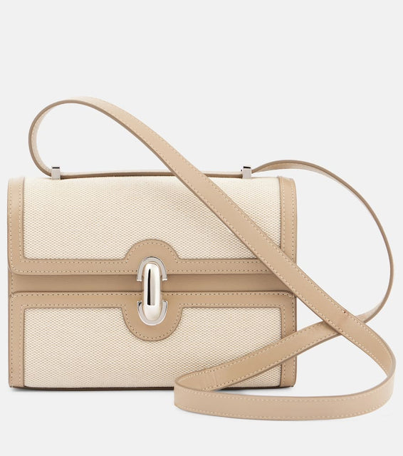 Savette Symmetry 19 canvas shoulder bag. Shop Savette Shoulder Bags for women now.