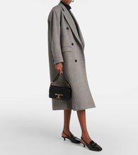 Tod's 35 leather slingback pumps