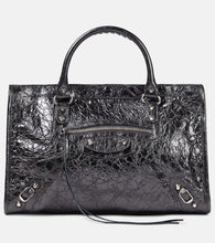 Balenciaga Le City Medium leather shoulder bag. Shop Balenciaga Shoulder Bags for women now.