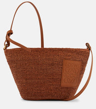 Loewe Slit Small raffia basket bag. Shop Loewe Crossbody Bags for women now.
