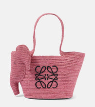 Loewe Elephant Small raffia basket bag. Shop Loewe Beach Bags for women now.