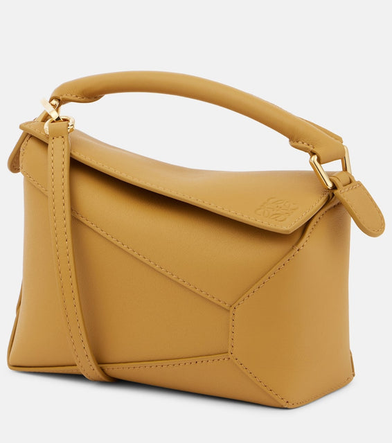 Loewe Puzzle Edge Mini leather shoulder bag. Shop Loewe Shoulder Bags for women now.