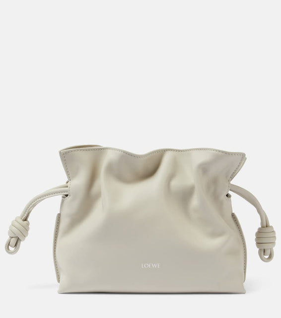 Loewe Flamenco Mini leather clutch. Shop Loewe Clutches for women now.