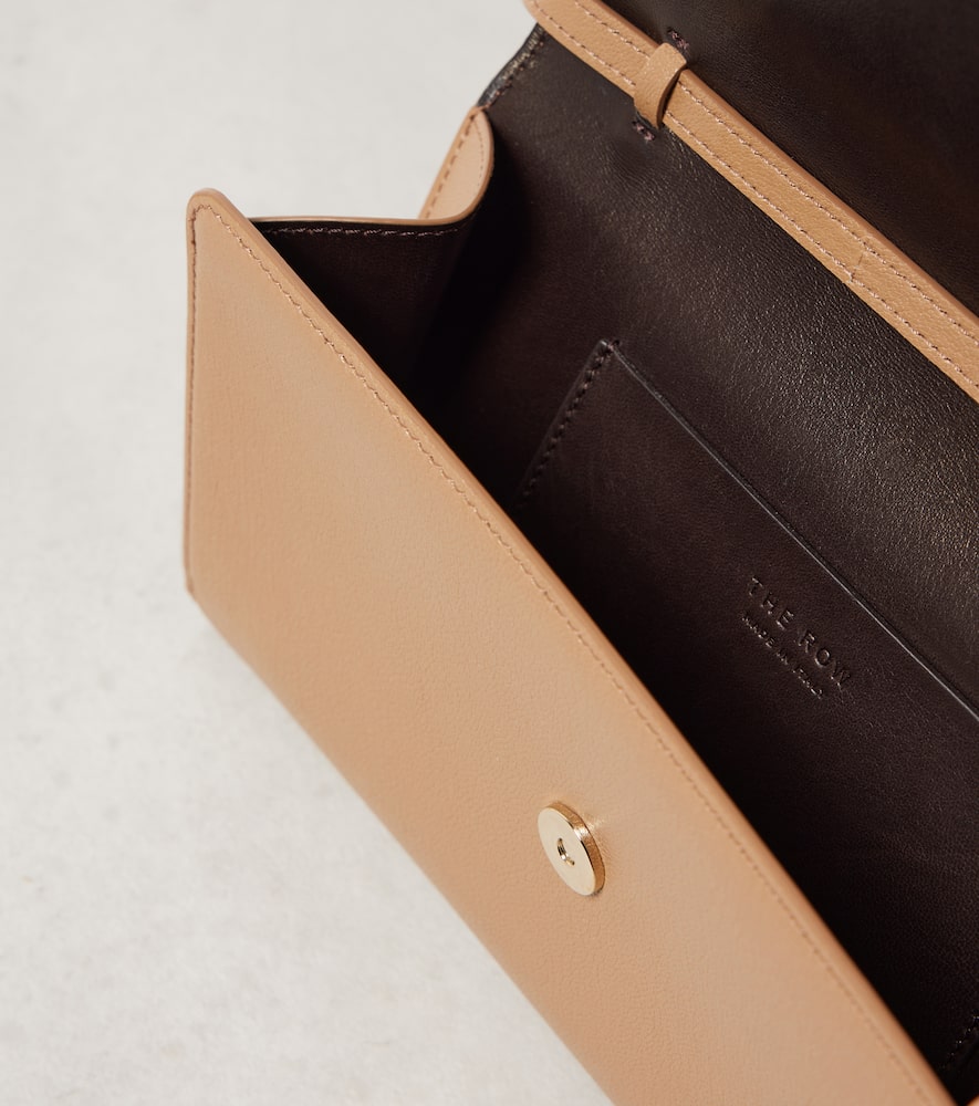 The Row Evening leather clutch