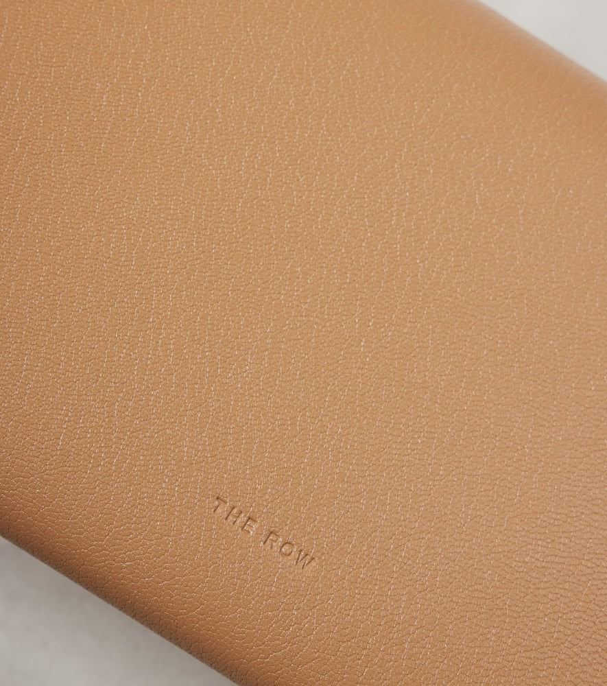The Row Evening leather clutch