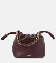 Loewe Flamenco Mini leather shoulder bag. Shop Loewe Top-Handle Bags for women now.