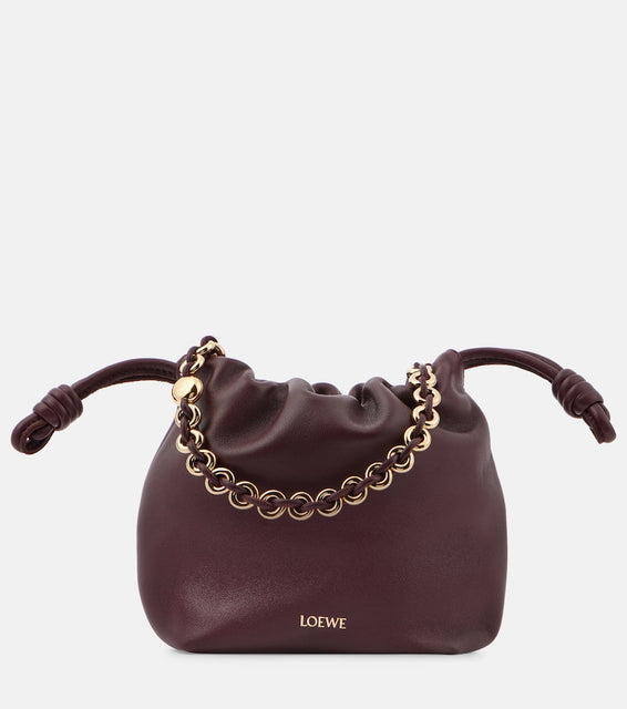 Loewe Flamenco Mini leather shoulder bag. Shop Loewe Top-Handle Bags for women now.
