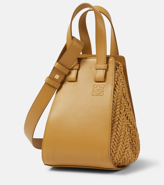 Loewe Hammock Compact leather tote bag. Shop Loewe Top-Handle Bags for women now.