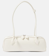 Alaia Le Teckel Medium leather shoulder bag. Shop Alaia Shoulder Bags for women now.
