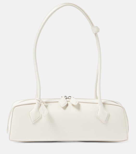 Alaia Le Teckel Medium leather shoulder bag. Shop Alaia Shoulder Bags for women now.