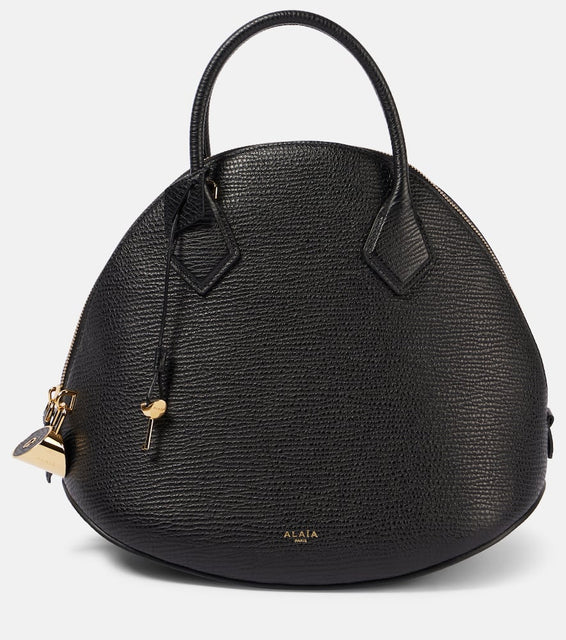 Alaia Dome 32 leather tote bag. Shop Alaia Top-Handle Bags for women now.