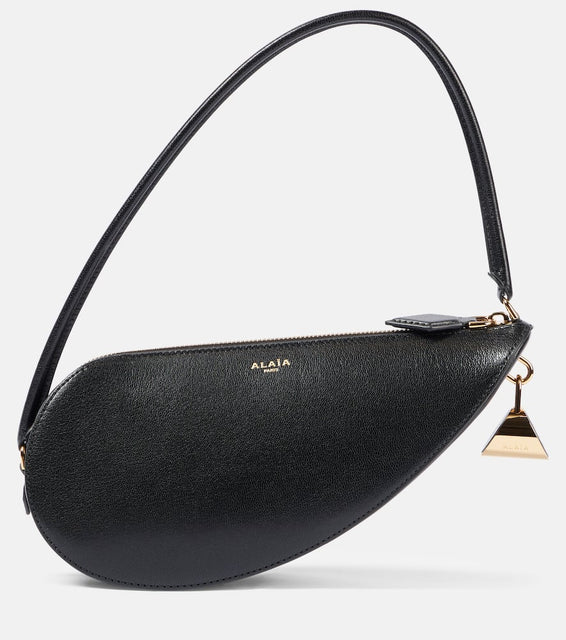 Alaia Le Demi-C√Ö¬ìur leather shoulder bag. Shop Alaia Shoulder Bags for women now.