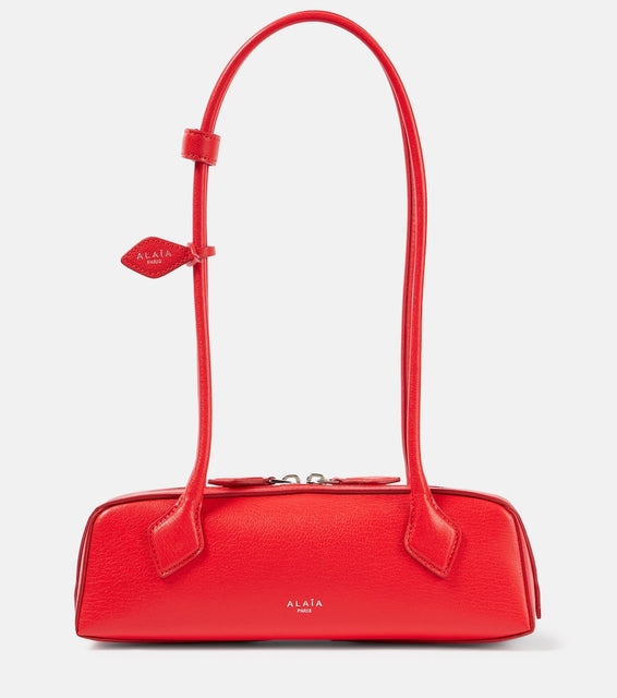 Alaia Le Teckel Small leather shoulder bag. Shop Alaia Shoulder Bags for women now.