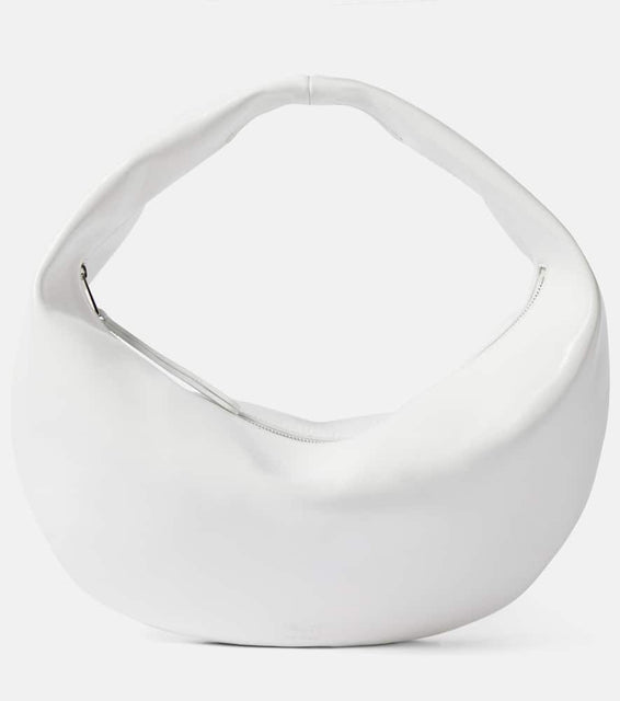 Khaite Olivia patent leather shoulder bag. Shop Khaite Shoulder Bags for women now.