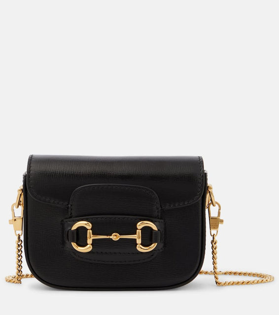 Gucci Gucci Horsebit 1955 Mini leather shoulder bag. Shop Gucci Crossbody Bags for women now.