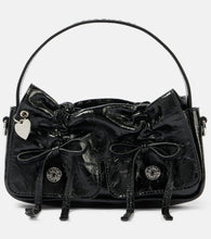 Acne Studios Multipocket leather shoulder bag. Shop Acne Studios Top-Handle Bags for women now.