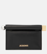 Jacquemus La Petite Pochette Rond Carr√É¬© leather clutch. Shop Jacquemus Clutches for women now.
