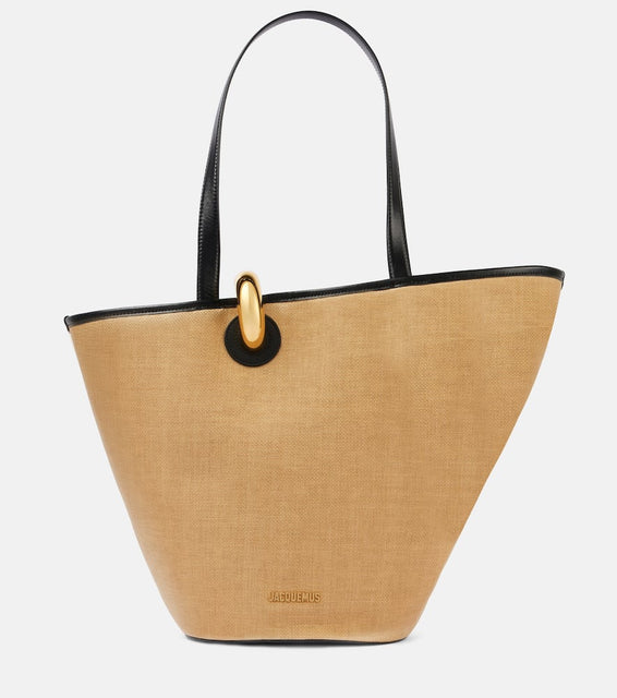Jacquemus Le Bambola leather-trimmed basket bag. Shop Jacquemus Tote Bags for women now.