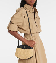 Savette Tondo leather-trimmed raffia crossbody bag