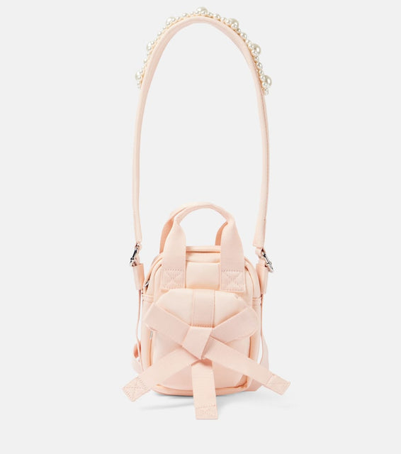 Simone Rocha Faux pearl-embellished crossbody bag. Shop Simone Rocha Top-Handle Bags for women now.