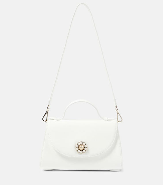 Simone Rocha Valentine leather shoulder bag. Shop Simone Rocha Top-Handle Bags for women now.