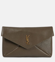Saint Laurent Cassandre Large leather clutch. Shop Saint Laurent Clutches for women now.