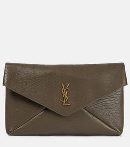 Saint Laurent Cassandre Large leather clutch. Shop Saint Laurent Clutches for women now.