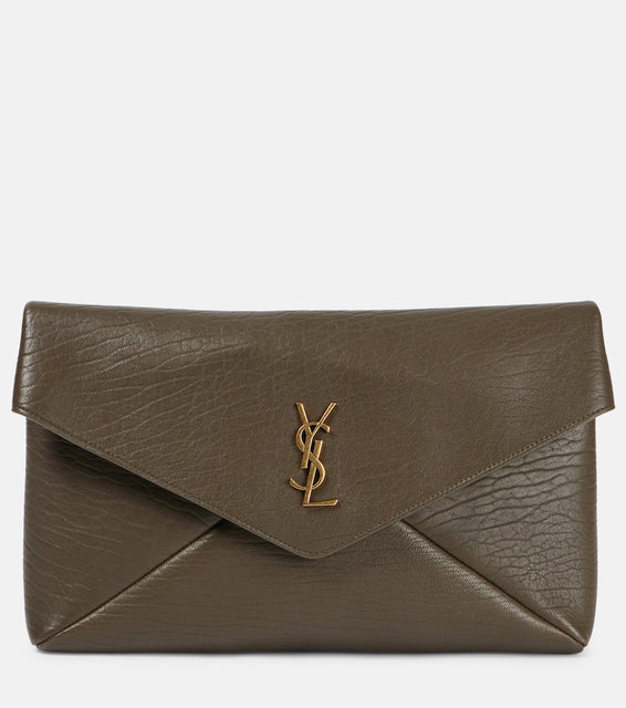 Saint Laurent Cassandre Large leather clutch. Shop Saint Laurent Clutches for women now.