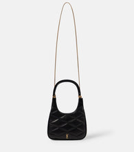 Saint Laurent Sade quilted leather shoulder bag. Shop Saint Laurent Shoulder Bags for women now.