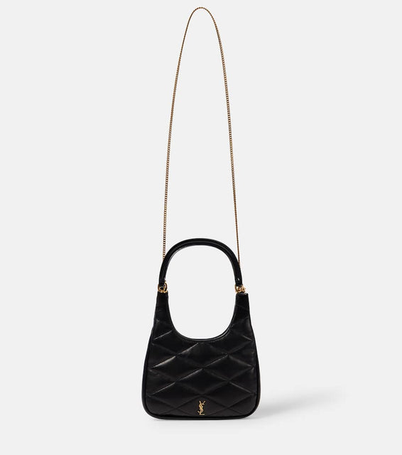 Saint Laurent Sade quilted leather shoulder bag. Shop Saint Laurent Shoulder Bags for women now.