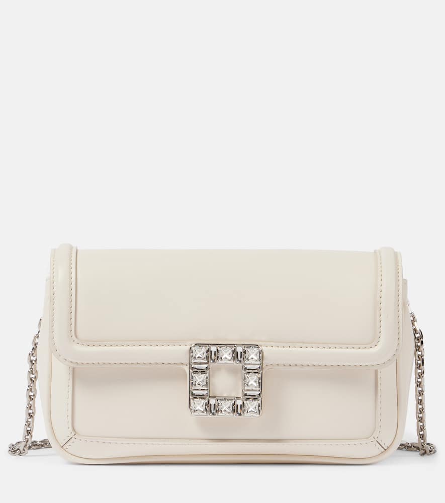 Roger Vivier Jeu De Fille shearling-trimmed shoulder bag. Shop Roger Vivier Mini Bags for women now.