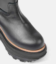 Sacai Leather platform knee-high boots