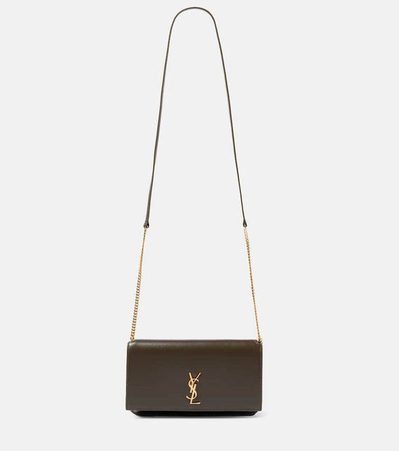 Saint Laurent Cassandre leather phone pouch. Shop Saint Laurent Crossbody Bags for women now.