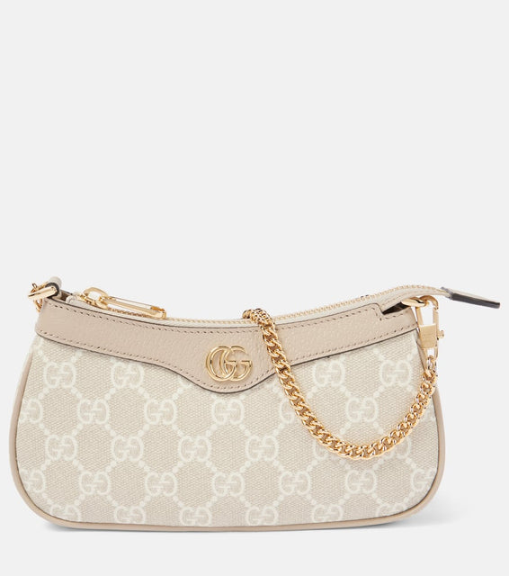 Gucci Ophidia Mini leather-trimmed shoulder bag. Shop Gucci Top-Handle Bags for women now.