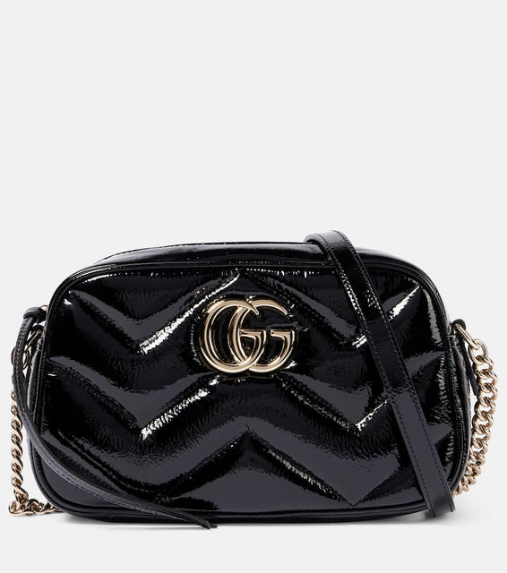 Gucci GG Marmont Mini patent leather shoulder bag. Shop Gucci Shoulder Bags for women now.