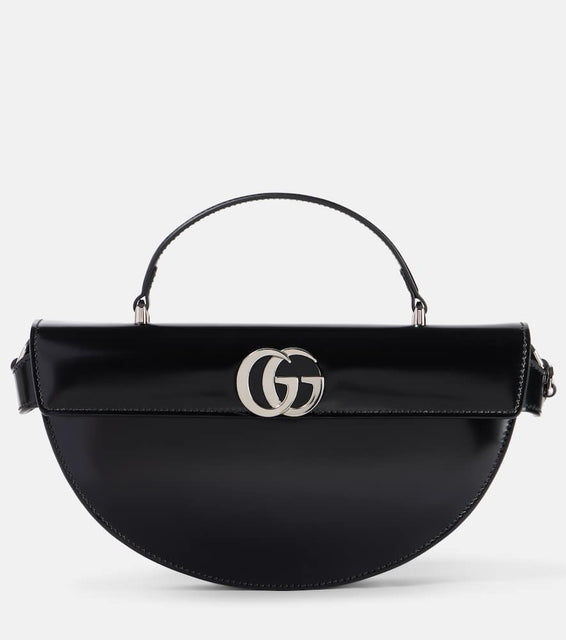 Gucci Half Moon Medium leather shoulder bag. Shop Gucci Top-Handle Bags for women now.