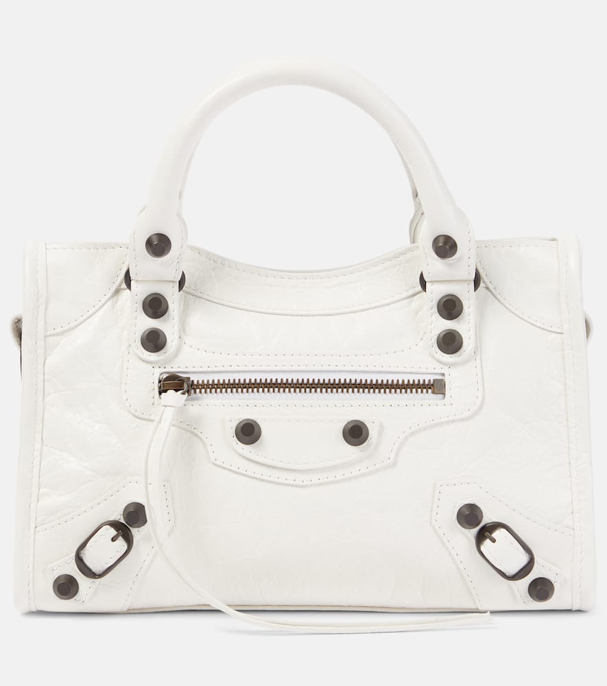 Balenciaga Le City Mini leather shoulder bag. Shop Balenciaga Top-Handle Bags for women now.