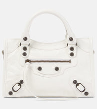 Balenciaga Le City Mini leather shoulder bag. Shop Balenciaga Top-Handle Bags for women now.