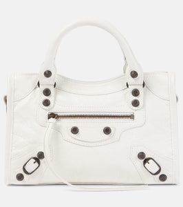 Balenciaga Le City Mini leather shoulder bag. Shop Balenciaga Top-Handle Bags for women now.