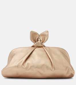 Aquazzura Bow Tie metallic leather clutch. Shop Aquazzura Clutches for women now.