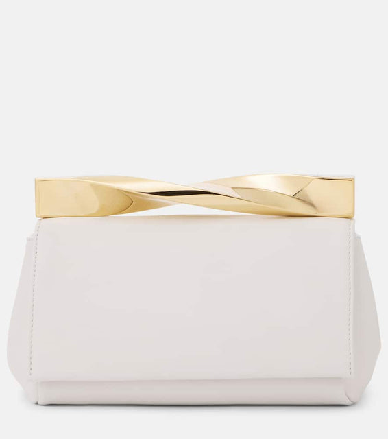 Aquazzura Twist Mini leather clutch. Shop Aquazzura Clutches for women now.