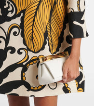 Aquazzura Twist Mini leather clutch