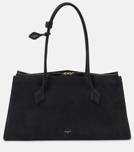 Alaia Le Teckel leather tote bag. Shop Alaia Tote Bags for women now.