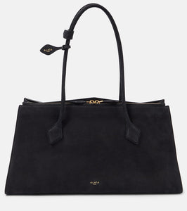 Alaia Le Teckel leather tote bag. Shop Alaia Tote Bags for women now.