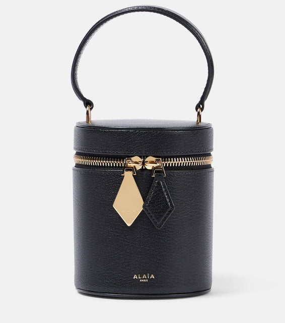 Alaia Cube Mini leather vanity bag. Shop Alaia Top-Handle Bags for women now.