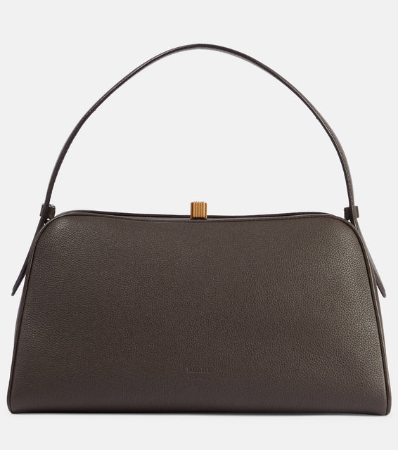 Khaite Cate leather tote bag. Shop Khaite Top-Handle Bags for women now.